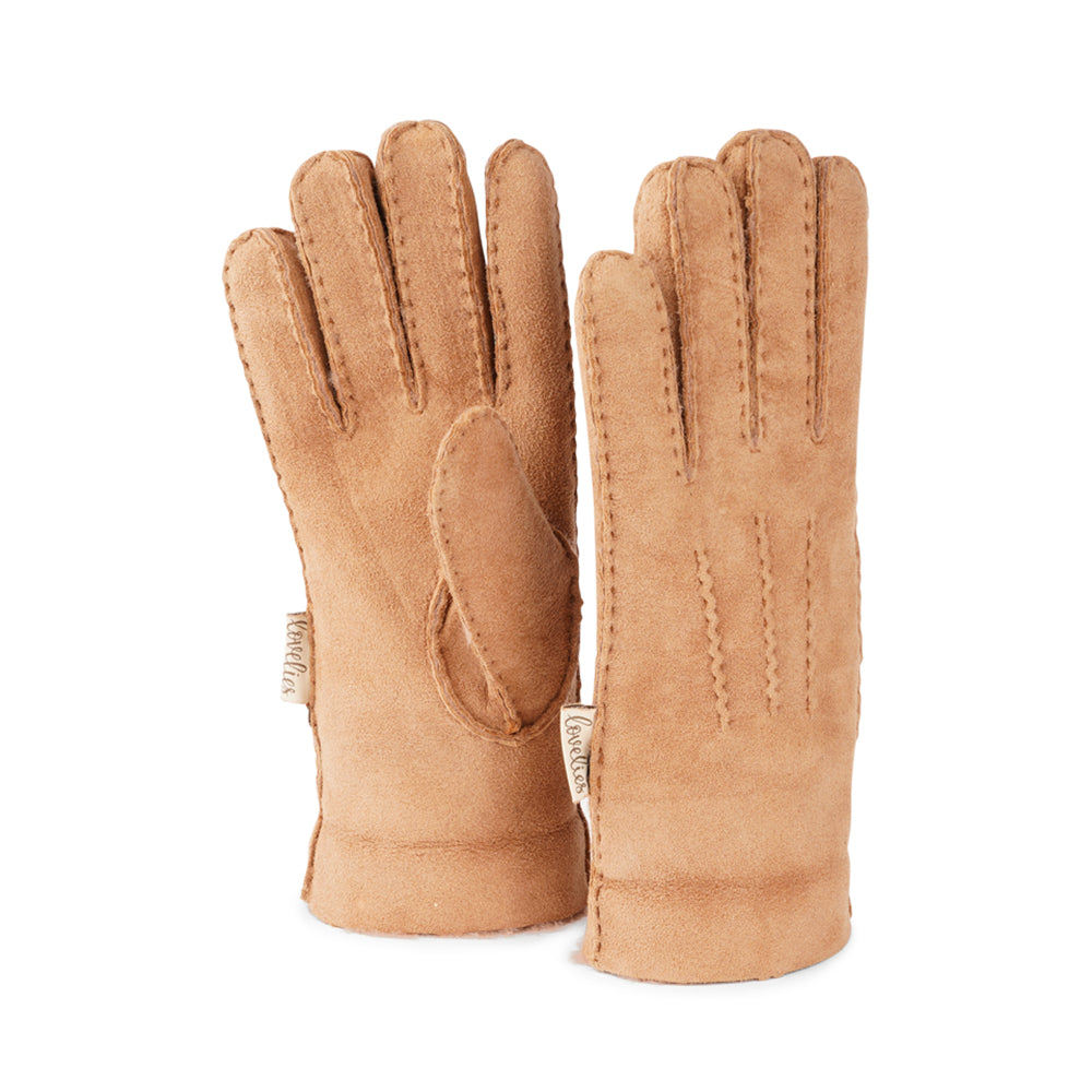 Elevate your winter wardrobe with our luxurious Kelly Shearling Gloves. Crafted from supple sheep leather, these gloves are designed to provide you with both style and warmth during the colder months.  These gloves are uniquely long and slim, providing a sleek and feminine silhouette that not only keeps you warm but also adds a chic touch to any outfit.