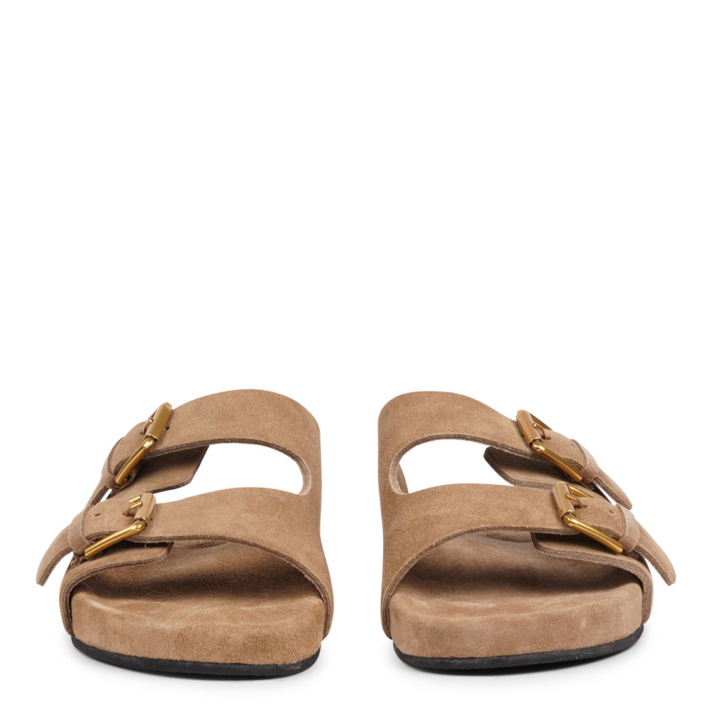 Lovelies Studio - Denmark - Effortlessly laid-back with a touch of understated luxury, these suede sandals are designed for all-day comfort and timeless appeal. Crafted from rich, soft suede, they feature two wide straps with adjustable gold-tone buckles for a customizable fit. The contoured footbed offers light support, while the flexible sole ensures ease of movement from indoors to out.
Perfect for casual days, warm getaways, or everyday lounging in style.