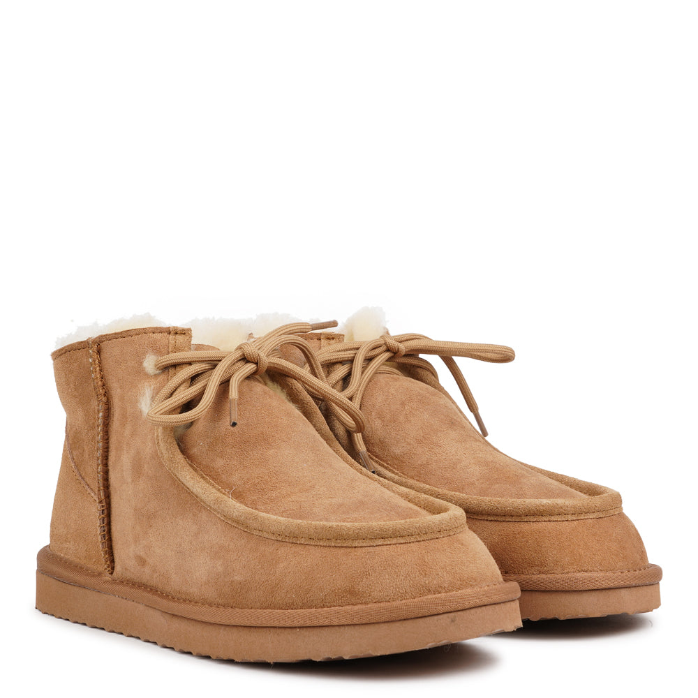 Step into effortless style and comfort with Lottulo, our low shearling boots designed for everyday wear. Crafted from soft, premium shearling and finished with classic laces, they offer a snug fit and timeless look. The durable rubber sole provides excellent grip and support, making them perfect for both city strolls and weekend getaways. A versatile winter essential that combines warmth, function, and understated elegance. The boots fit true to size, so we recommend ordering your usual size.