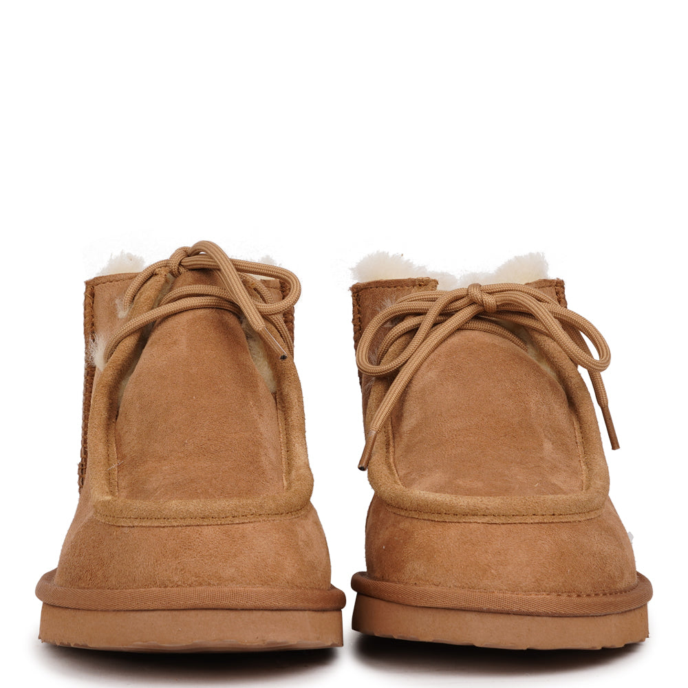 Step into effortless style and comfort with Lottulo, our low shearling boots designed for everyday wear. Crafted from soft, premium shearling and finished with classic laces, they offer a snug fit and timeless look. The durable rubber sole provides excellent grip and support, making them perfect for both city strolls and weekend getaways. A versatile winter essential that combines warmth, function, and understated elegance. The boots fit true to size, so we recommend ordering your usual size.