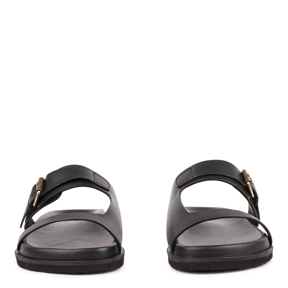 Marina - a beautifully handcrafted leather sandal that blends feminine elegance with everyday comfort. Designed with a single adjustable strap, it offers a secure, personalized fit that moves effortlessly with you throughout the day.

Crafted from vegetable-tanned buffalo leather, the soft yet durable straps are made to age beautifully over time. Finished with a discreet rubber grip, Marina provides stability and ease - perfect for both relaxed daytime wear and more refined evening looks.