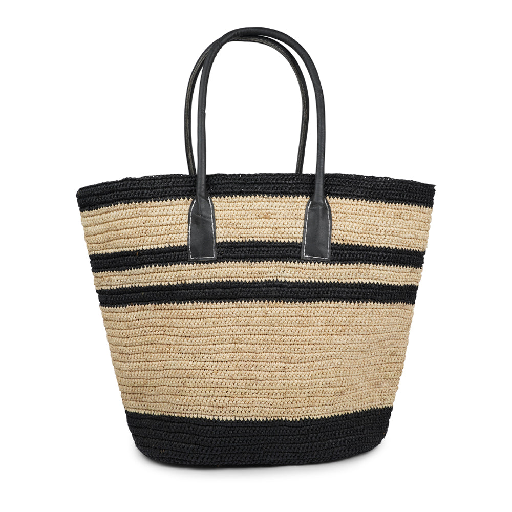 Lovelies - Effortlessly chic and naturally elegant, the Marini Large bag is your ideal companion for sunny days and relaxed escapes. Handwoven from 100% natural raffia by artisans in Madagascar, it blends timeless craftsmanship with modern versatility.

The textured raffia and earthy tones add laid-back sophistication to any look, while its lightweight design and comfortable shoulder handles make it perfect for beach days, market strolls, or weekend getaways.