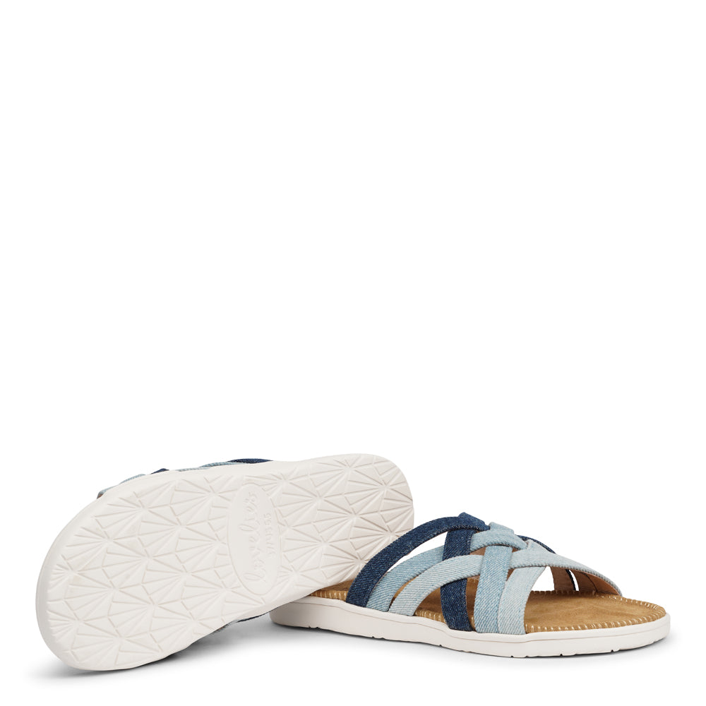 Lovelies Studio - Matara sandal, drawing inspiration from the stunning coasts of Sri Lanka.  This sandal is a luxurious treat, featuring durable rubber embraced by velvety suede. With delicate denim straps adding a playful flair, it effortlessly enhances any ensemble. It's the ultimate blend of chic and trendy style