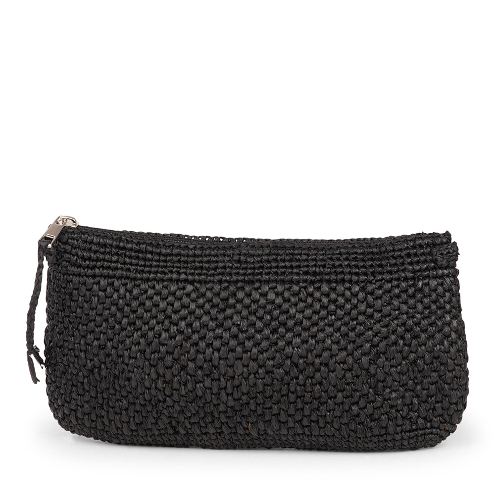 Meliso, the little charming clutch fashioned from luxurious raffia sourced from Madagascar.  Raffia, derived from the resilient leaves of the palm tree, is celebrated for its versatility and eco-conscious qualities, making it a sought-after material in the realm of fashion accessories.