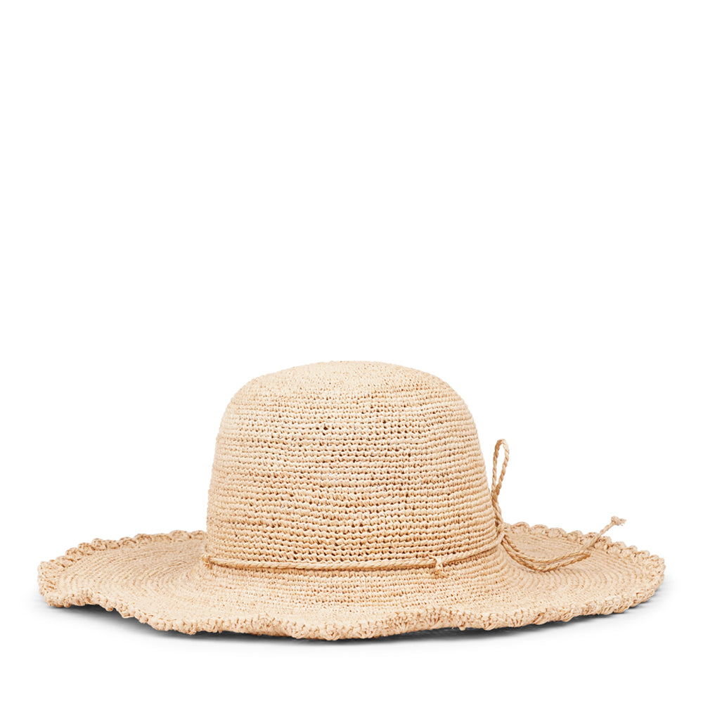 Lovelies Studio - Crafted from raffia, a natural fiber celebrated for its strength and suppleness, the Minzoni hat embodies both style and sustainability. Utilizing traditional methods, the raffia is hand-dyed and left to bask in the sun, minimizing its environmental footprint.