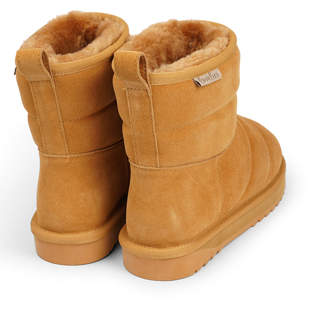 Lovelies -Nebo shearling boots - Crafted with both comfort and durability in mind, Nebo boasts a soft and resilient rubber sole that's perfect for tackling wintery conditions. And let's not forget the exquisite design that complements your style effortlessly, ensuring you're fashionably prepared for the season ahead. 