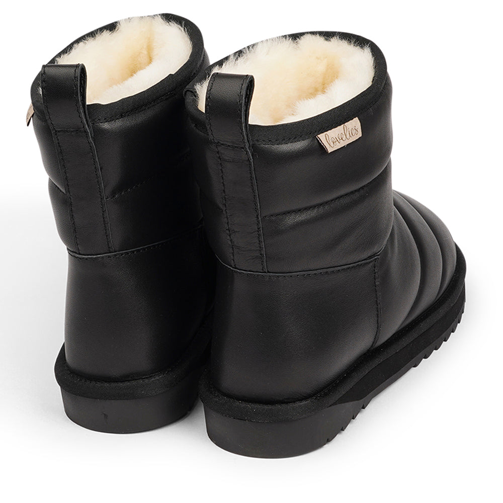 Lovelies - Nebo - Nebo, the epitome of cozy chic, is here to elevate your autumn and winter footwear game. These mid-high shearling boots are designed to envelop your feet in softness and warmth, making every step a delight.  Crafted with both comfort and durability in mind, Nebo boasts a soft and resilient rubber sole that's perfect for tackling wintery conditions.