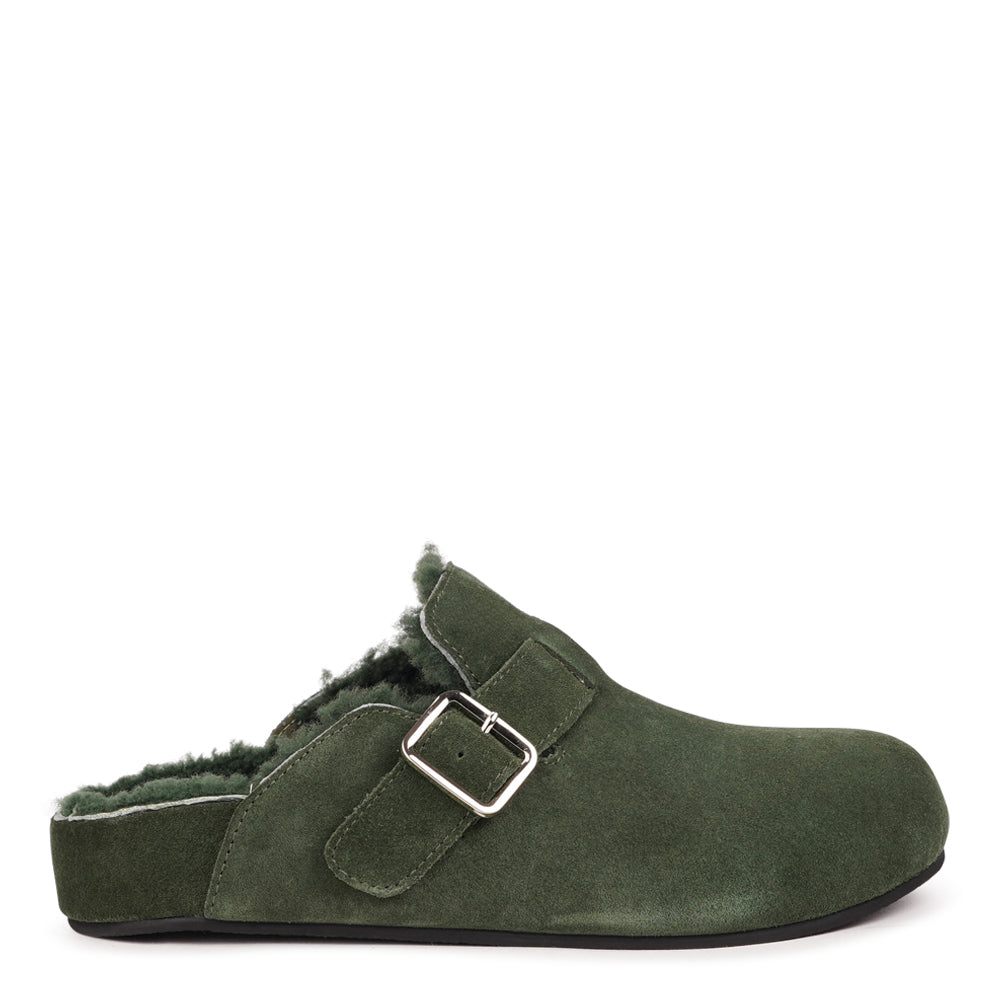 Lovelies Studio - The Nesso Suede Mules are the epitome of luxurious comfort and style. Crafted with a premium suede upper, these exclusive mules feature an adjustable buckle for a customized fit. Lined with soft curly shearling, they provide warmth and a cozy feel, perfect for cooler days.