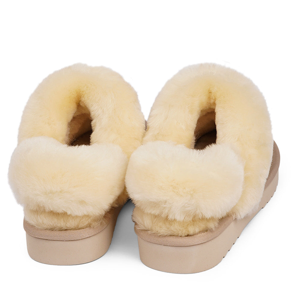Wrap your feet in warmth and comfort this autumn with our Lovelies shearling mules. Crafted from soft shearling and finished with a durable rubber sole, they combine luxurious coziness with everyday practicality. The detachable heel strap adds versatility, making them perfect for both lounging and stepping outside in style.