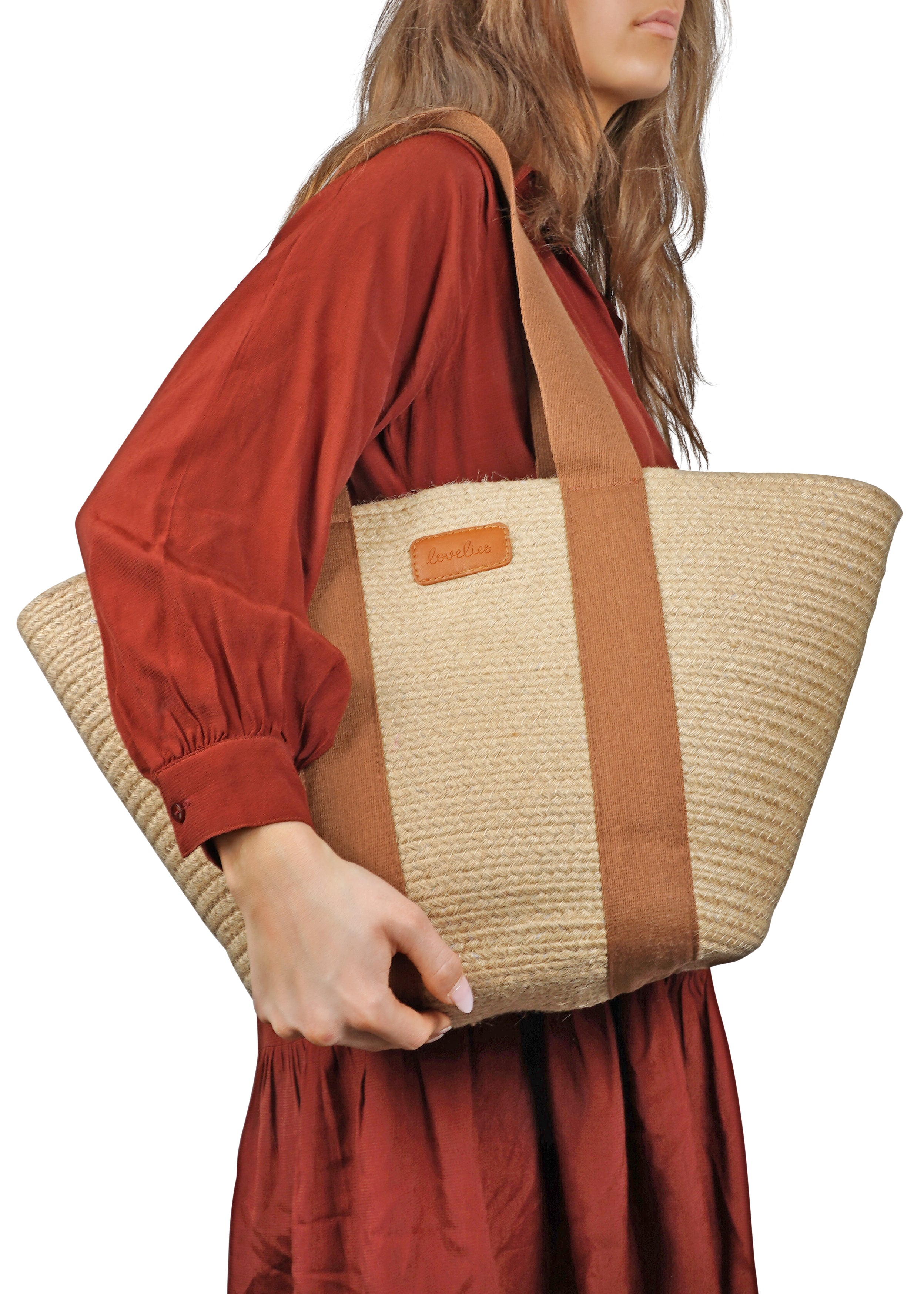 Lovelies Studio - Bring effortless style to your summer days with&nbsp;Peppino, our beautifully crafted beach bag made from natural jute. Lightweight yet durable, Peppino is designed to carry all your essentials while adding a touch of rustic elegance to any outfit.

The standout colorful handle brings a fun, vibrant twist to the bag’s natural texture, making it the perfect accessory for beach trips, market strolls, and sunny getaways. Spacious, stylish, and easy to pair with your favorite summer looks, Pep