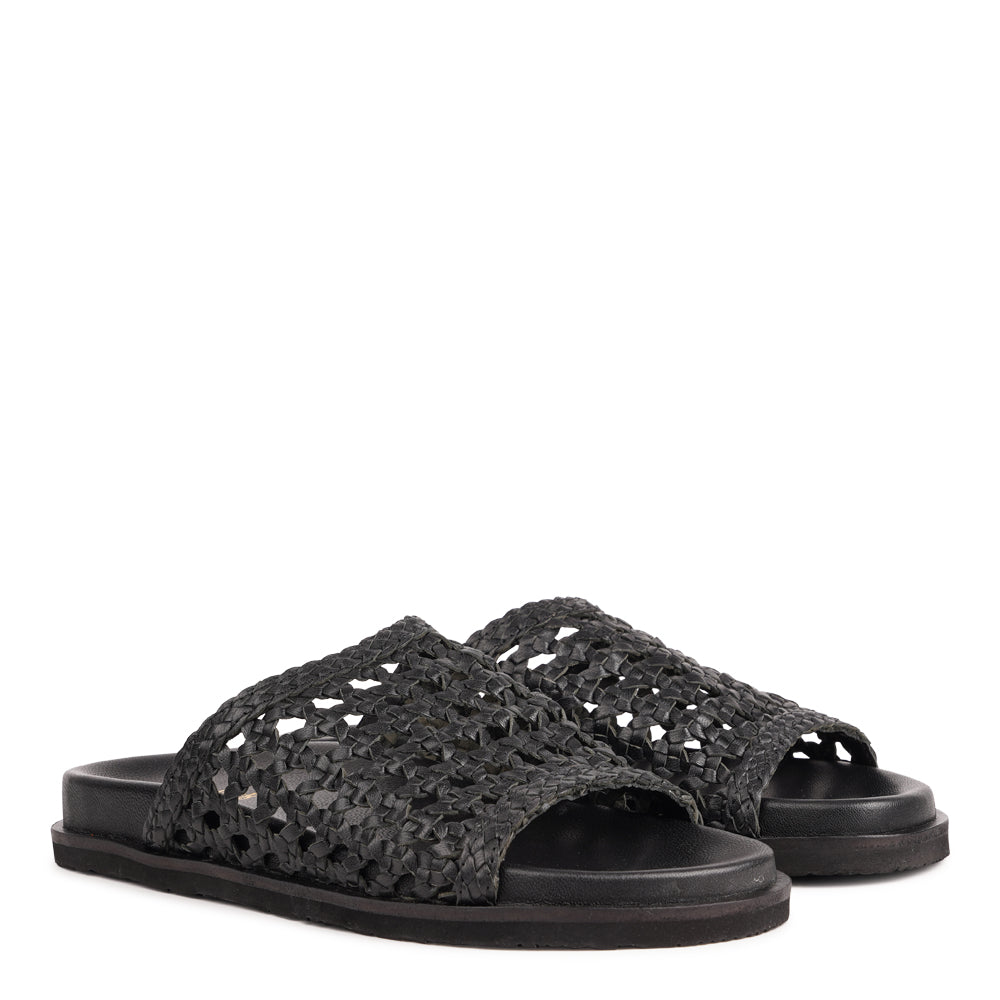 Lovelies Studio - Positano — a beautifully handcrafted leather sandal that blends feminine elegance with everyday comfort. Designed with a wide, handwoven leather strap and a soft leather insole for a natural, comfortable feel.

Crafted from vegetable-tanned leather, the supple yet durable straps are made to age beautifully over time. Finished with a durable rubber outsole for reliable grip, Positano offers both stability and ease—perfect for relaxed daytime wear and more refined evening occasions.