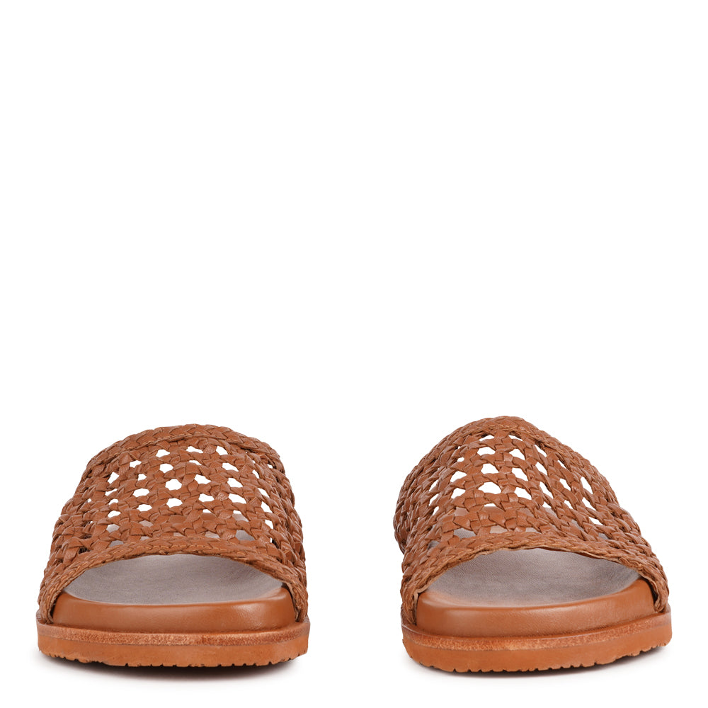 Lovelies Studio - Positano — a beautifully handcrafted leather sandal that blends feminine elegance with everyday comfort. Designed with a wide, handwoven leather strap and a soft leather insole for a natural, comfortable feel.

Crafted from vegetable-tanned leather, the supple yet durable straps are made to age beautifully over time. Finished with a durable rubber outsole for reliable grip, Positano offers both stability and ease—perfect for relaxed daytime wear and more refined evening occasions.