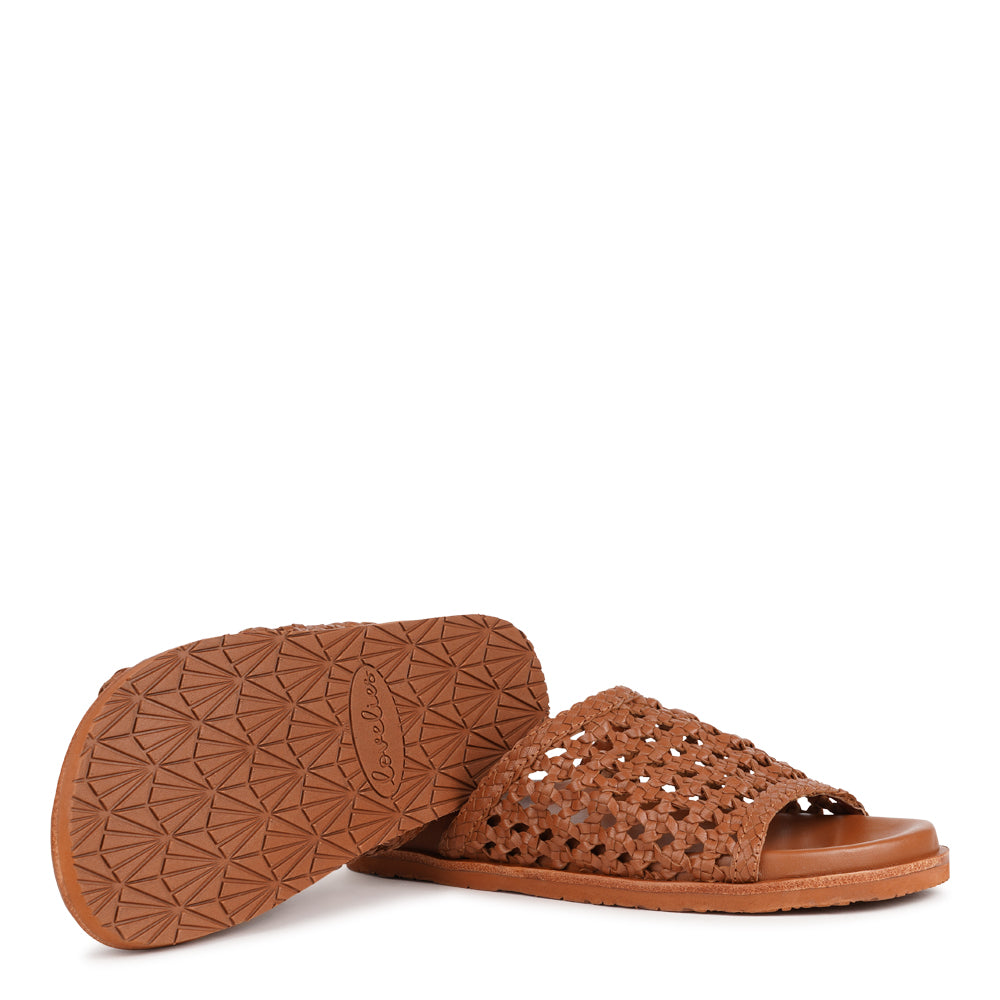 Lovelies Studio - Positano — a beautifully handcrafted leather sandal that blends feminine elegance with everyday comfort. Designed with a wide, handwoven leather strap and a soft leather insole for a natural, comfortable feel.

Crafted from vegetable-tanned leather, the supple yet durable straps are made to age beautifully over time. Finished with a durable rubber outsole for reliable grip, Positano offers both stability and ease—perfect for relaxed daytime wear and more refined evening occasions.