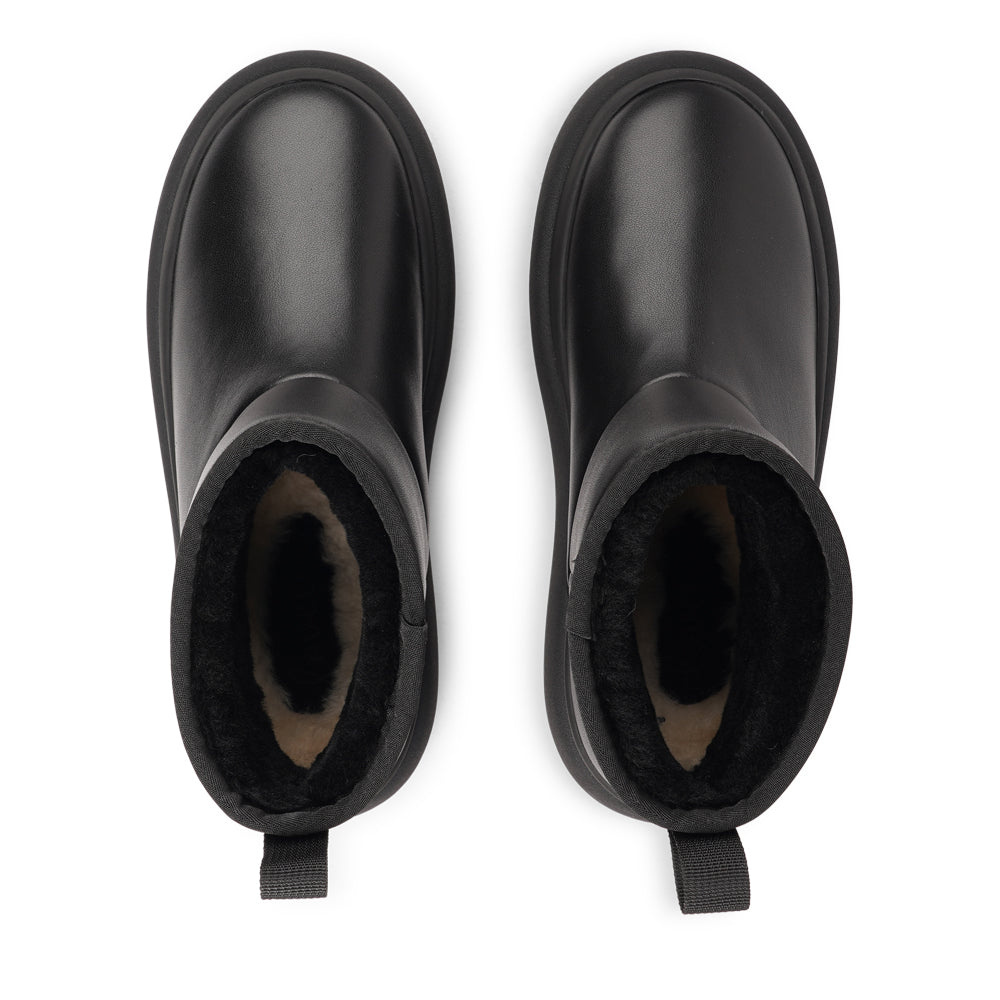 Step into autumn with the luxurious comfort of the Premana Mid-High Shearling Boots!
Crafted with plush shearling lining, these boots envelop your feet in warmth and softness, making them your go-to choice for chilly days. The durable rubber soles provide excellent traction, ensuring stability and support on any terrain.