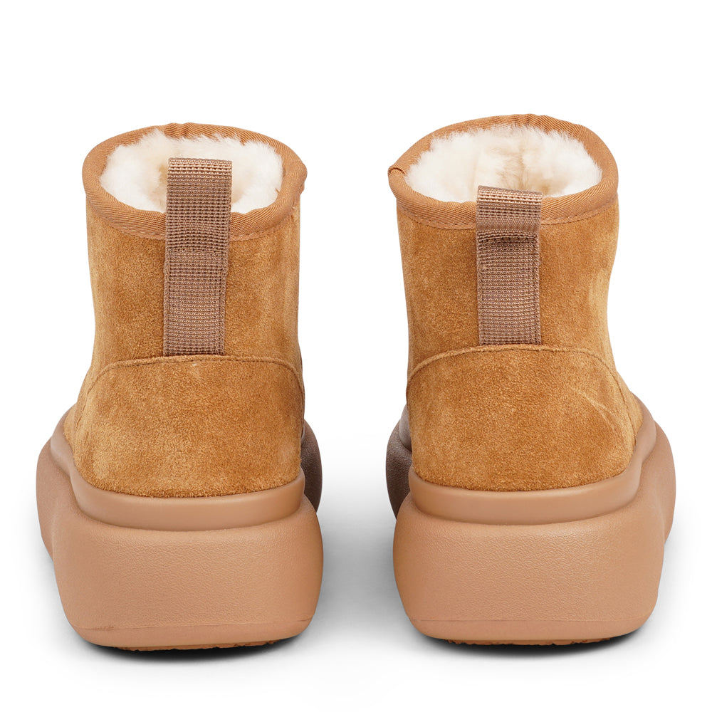 Step into autumn with the luxurious comfort of the Premana Mid-High Shearling Boots!

Crafted with plush shearling lining, these boots envelop your feet in warmth and softness, making them your go-to choice for chilly days. The durable rubber soles provide excellent traction, ensuring stability and support on any terrain.

With their stylish mid-high design, the Premana boots effortlessly combine fashion and function, making them perfect for winter outings or cozy nights in. Elevate your wardrobe with these