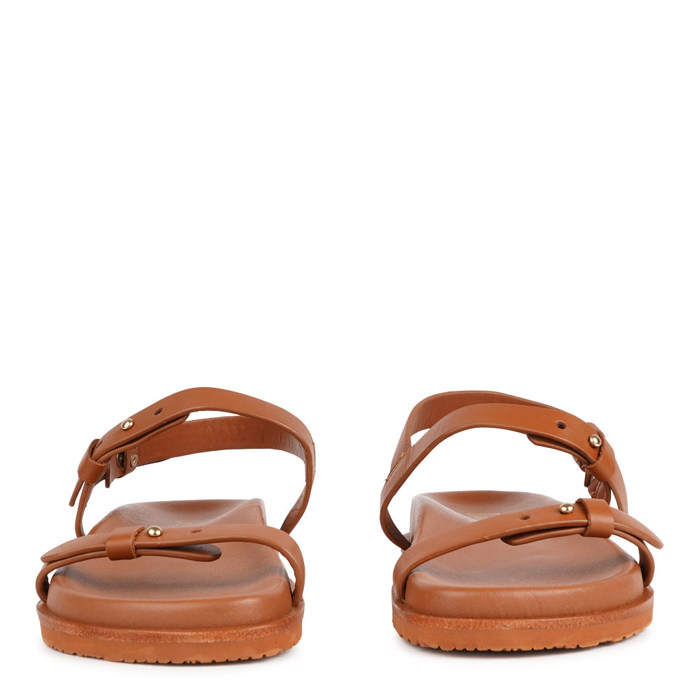 Lovelies Studio - Ravello - a handcrafted leather sandal that combines feminine elegance with everyday comfort. Designed with slim, adjustable straps, it offers a secure, personalized fit that moves effortlessly with you throughout the day.

Crafted from vegetable-tanned buffalo leather, the soft yet durable straps are made to age beautifully over time. A soft leather insole and a durable rubber outsole provide stability and ease - perfect for both relaxed daytime wear and more refined evening looks.