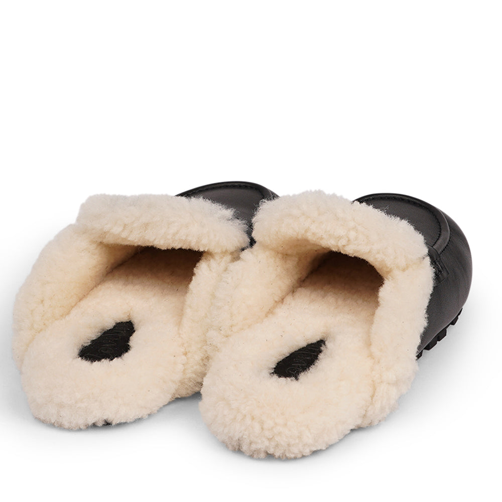 Lovelies Studio - Denmark Suede Mules with curly shearling lining  Lovelies shearling mules will bring softness and warmth to your feet this autumn. The combination of soft curly shearling and the durable cork and rubber sole guarantees the utmost comfort to the wearer.