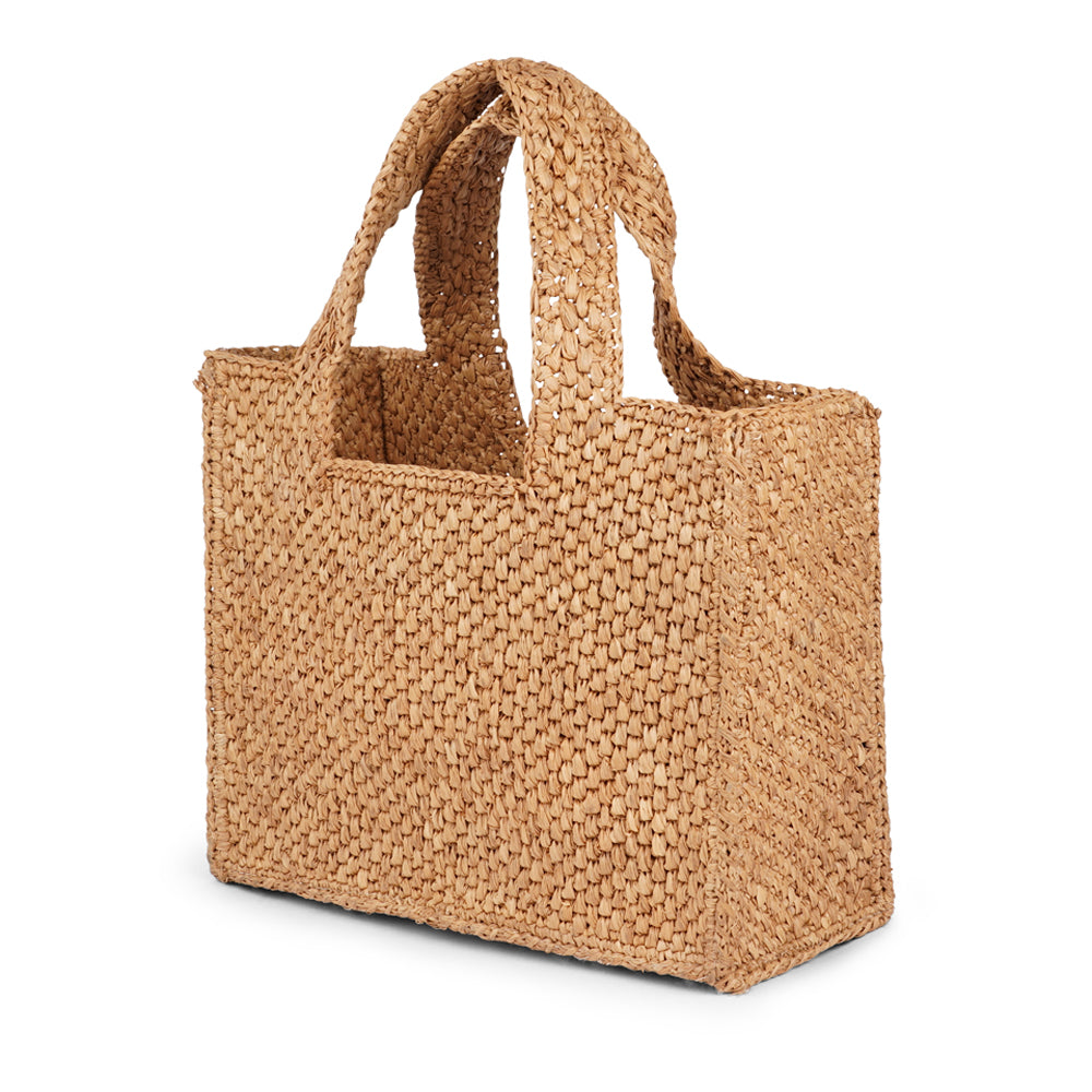 Lovelies - Effortlessly chic and naturally elegant, the Rivabella bag is your go-to accessory for sun-soaked days and breezy evenings. Handwoven from 100% raffia by skilled artisans in Madagascar, this compact yet spacious bag blends timeless craftsmanship with modern simplicity.

The raffia’s rich texture and earthy tone add a relaxed sophistication to any look—perfect for everything from a city stroll to a summer soirée. Lightweight yet durable, Rivabella is designed to accompany you all day with ease. Th