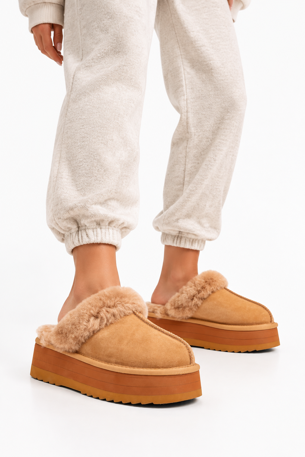 Lovelies Studio - Denmark -What sets the Robson mules apart is their plush shearling lining, which envelops your feet in a cloud-like cocoon of comfort. The shearling not only adds a touch of opulence but also provides natural insulation, keeping your feet toasty even on the chilliest of days.