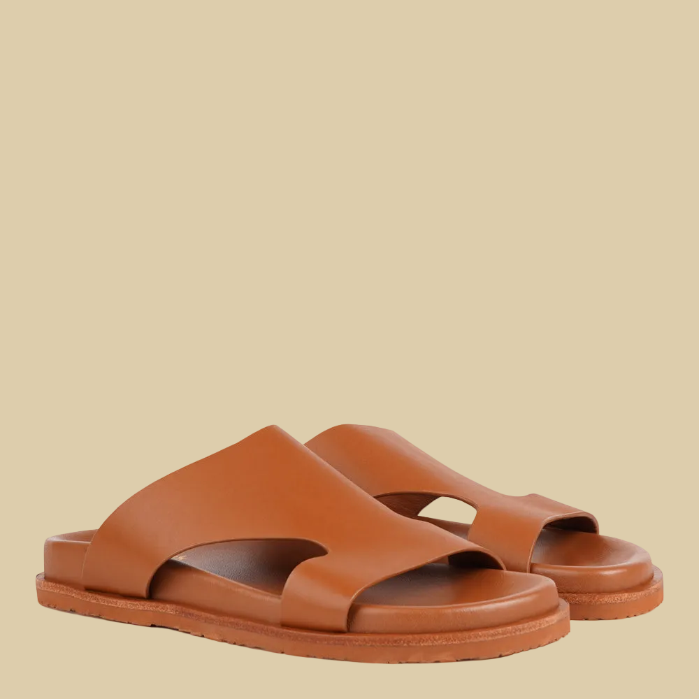 Lovelies Studio - Sassano - a beautifully handcrafted leather sandal that combines feminine elegance with everyday comfort. Designed with a wide upper for enhanced support and a soft leather insole for a natural, comfortable feel.

Crafted from vegetable-tanned leather, the durable straps are made to age beautifully over time. Finished with a sturdy rubber outsole for reliable grip, Sassano offers both stability and ease - perfect for relaxed daytime wear and more refined evening occasions.