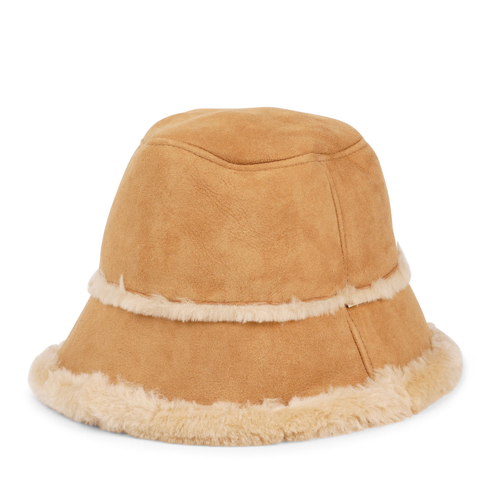 Lovelies Studio -  danish design - Would you like to stay warm and trendy this winter then the Semeru bucket hat could be a great add on to your wardrobe.  Material:  Made with 100% Sheepskin. This incredible material balances form with function, offering a chic look with lightweight insulation in the winter and temperature regulation when spring arrives. 