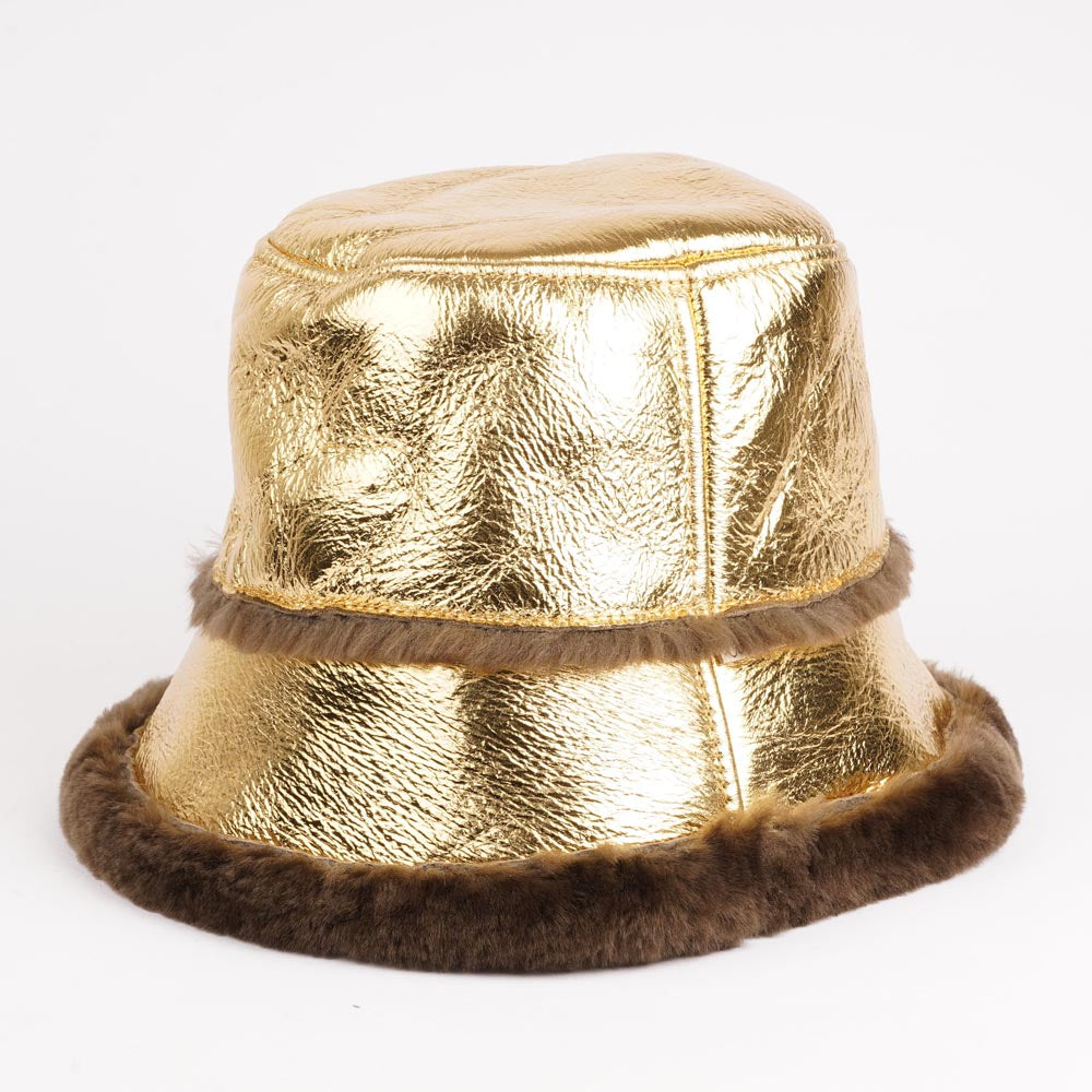 Would you like to stay warm and trendy this winter then the Semeru bucket hat could be a great add on to your wardrobe.  Material:  Made with 100% Sheepskin. This incredible material balances form with function, offering a chic look with lightweight insulation in the winter and temperature regulation when spring arrives. 
