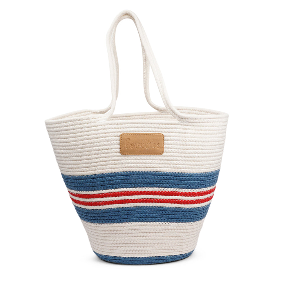 Lovelies Studio - Meet the SILVI beach bag - it's all about simple, laid-back cool. Crafted from sturdy cotton ropes, this bag is built to last and adds a touch of natural charm to your beach essentials. The SILVI keeps it sleek with a clean white top, oozing effortless style. But it's got a playful side too, with a belt of colors and a matching solid color bottom that really makes it stand out.
