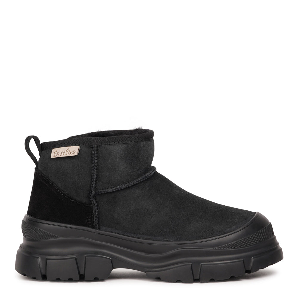 Taipana – Low Shearling Boots

Stay warm and effortlessly stylish this season with Lovelies’ Taipana boots — where cozy comfort meets timeless design. Made from soft natural shearling with refined stitching details, these low boots bring a touch of understated luxury to your everyday look.

The lightweight EVA rubber sole adds flexibility and grip, giving you comfort and stability with every step. Perfect for chilly days, Taipana keeps your feet snug, supported, and ready for winter adventures.