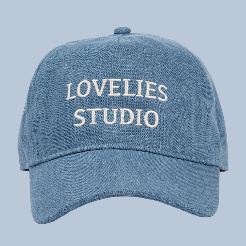 TOLLO - Denim Cap with Lovelies Embroidery

Top off your look with the Tollo Cap — a classic cotton cap featuring the iconic Lovelies embroidered logo. Effortlessly cool and made for everyday wear, it's the finishing touch your outfit has been waiting for.

With its adjustable back strap for best fit.&nbsp;