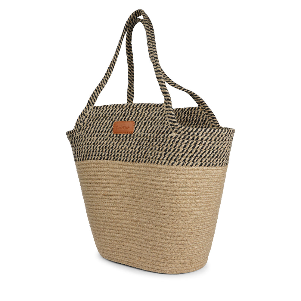 Meet the Tomba bag, where eco-friendly materials meet effortless style. Made from a durable blend of cotton and jute rope, Tomba is designed for those who love a chic, sustainable accessory that’s perfect for every day.

This two-tone stylish tote bag adds a modern touch to your look, while the long shoulder straps make it easy to carry, whether you’re out for a day of shopping, heading to the beach, or simply running errands.
Tomba – the perfect combination of style, comfort, and sustainability.