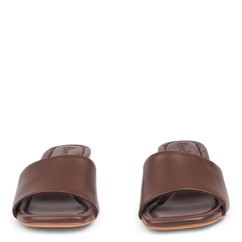 Step into ultimate comfort and feminine elegance with our nappa leather sandals featuring a beautiful wide strap. Indulge in the delicate and soft fabrics that will make you feel both at ease and effortlessly stylish.

These sandals are designed to be versatile, perfectly complementing your feminine dresses or adding a chic touch to your summer skirt. Embrace the comfort and sophistication of these easy-to-go sandals that are destined to become your go-to footwear choice.