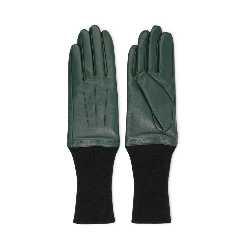 Elevate your winter wardrobe with the Udine gloves, a perfect blend of luxury and comfort. Crafted from soft, supple lambskin, these gloves offer a refined touch and a sleek silhouette. The extended knit cuff provides extra warmth and a snug fit, while adding a stylish, contemporary edge.

Designed for both elegance and practicality, Udine gloves are ideal for keeping your hands cozy during chilly days without compromising on style. A sophisticated accessory that pairs effortlessly with any winter outfit.
