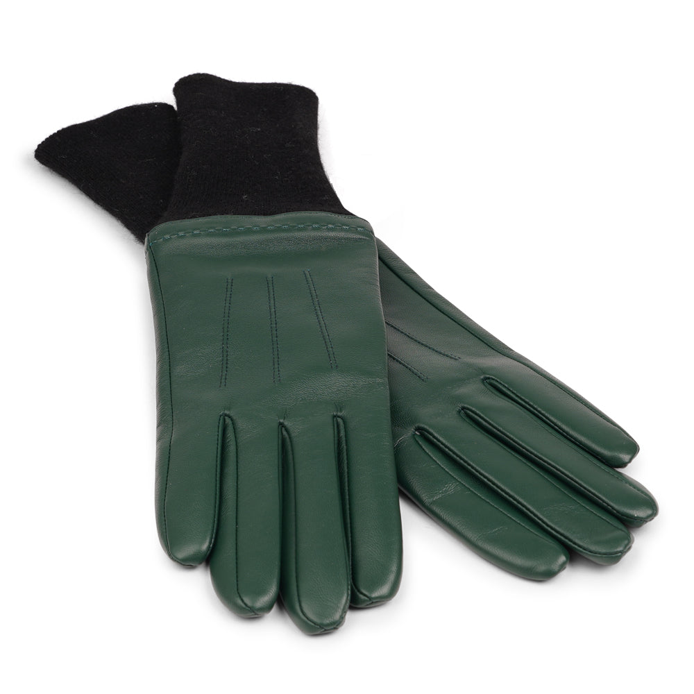 Elevate your winter wardrobe with the Udine gloves, a perfect blend of luxury and comfort. Crafted from soft, supple lambskin, these gloves offer a refined touch and a sleek silhouette. The extended knit cuff provides extra warmth and a snug fit, while adding a stylish, contemporary edge.

Designed for both elegance and practicality, Udine gloves are ideal for keeping your hands cozy during chilly days without compromising on style. A sophisticated accessory that pairs effortlessly with any winter outfit.