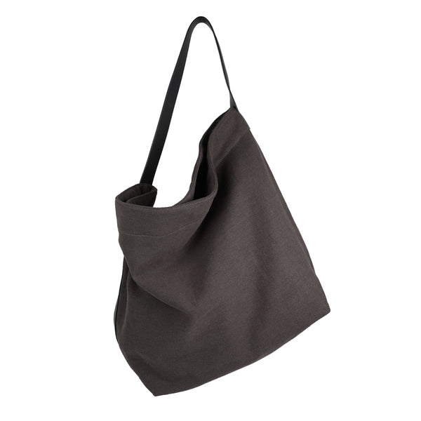 Our Lovelies casual shoulder shopper bag is made of high quality linen and a soft 100% leather handle. The bag has a large primary compartment in which you can fit in all of your stuff when you're on the go.    Inside the shopper bag there's a magnetic button closure at the top as well as a  phone pocket.  60% Linen & 40% Cotton   Double Lining   100% Leather handle  Inside phone pocket  Size H41 x W52 x D20 cm