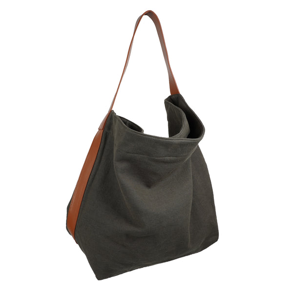 Our Lovelies casual shoulder shopper bag is made of high quality linen and a soft 100% leather handle. The bag has a large primary compartment in which you can fit in all of your stuff when you're on the go.    Inside the shopper bag there's a magnetic button closure at the top as well as a  phone pocket.  60% Linen & 40% Cotton   Double Lining   100% Leather handle  Inside phone pocket  Size H41 x W52 x D20 cm