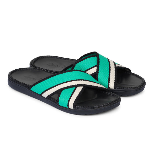 Sandals with cross webbing straps. The comfortable inner sole is covered with black leather.