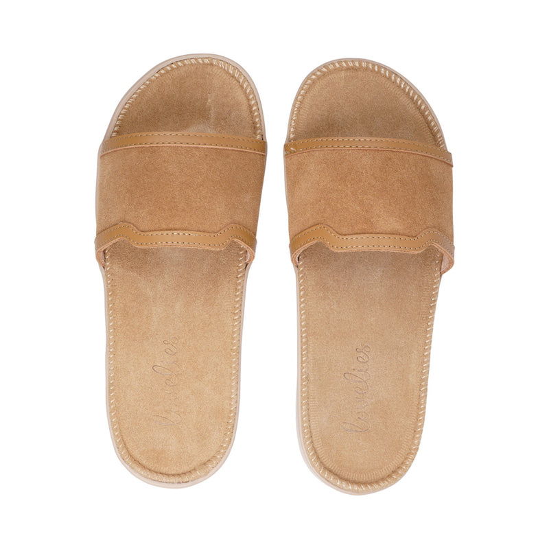 Once you’ve tried Lovelies’ summer sandals you’ll never want to wear any other footwear.  With its delicate and soft fabrics, you feel at ease and elegant at the same time. The easy to-go sandals with their striking summer colours are a perfect fit to your feminine summer dresses and your light blue summer jeans.  Enjoy your Lovelies!   Material:  Outsole / Insole : Rubber Footbed: Suede (100% cow leather) Lining: 100% cow leather Upper: Suede (100% cow leather)