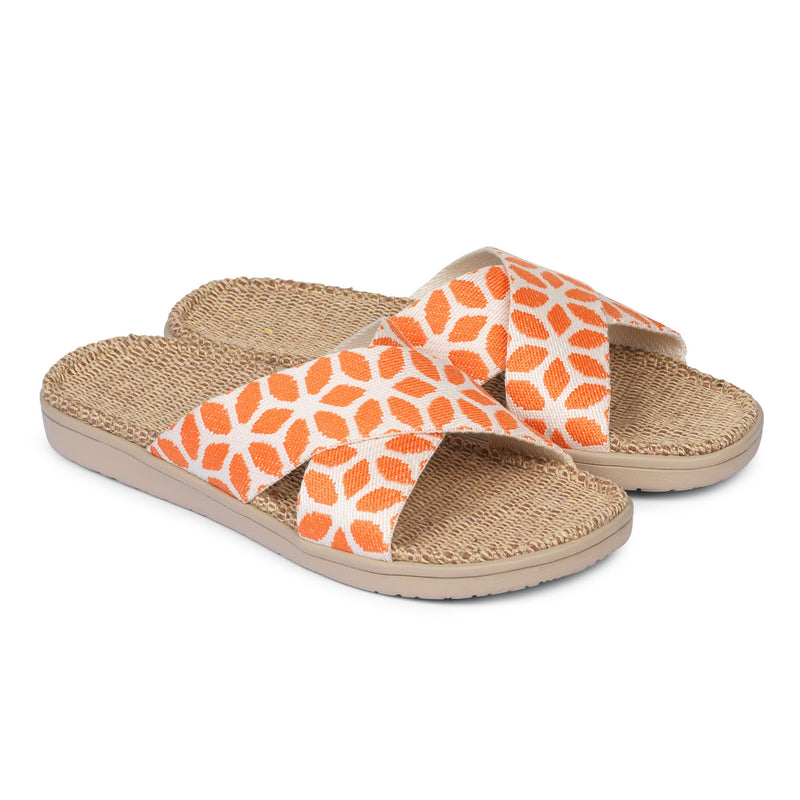Sandal with flower patterns woven straps. The soft inner sole is covered with natural jute material.