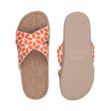 Sandal with flower patterns woven straps. The soft inner sole is covered with natural jute material.