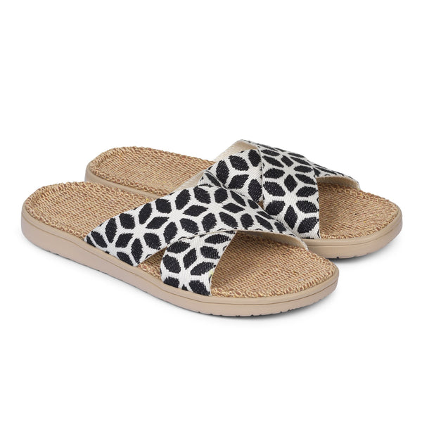 Sandal with flower patterns woven straps. The soft inner sole is covered with natural jute material.