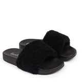 Lovelies Slides with Australian Shearling upper.  This wonderful slide has a soft and light rubber sole which makes it very comfortable and an all time favorite sandal. The 100% shearling wool will keep you warm or cool you down on hot summer days. 
