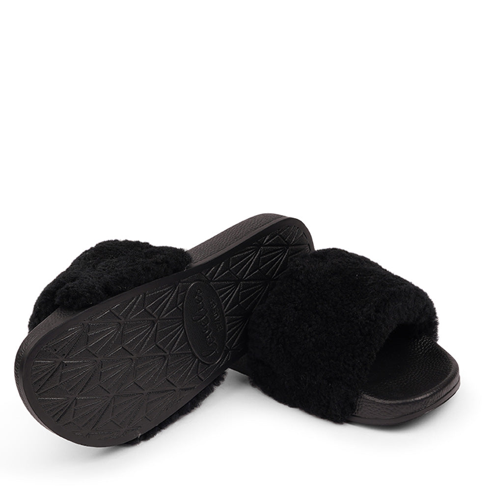 Slides with Australian Shearling upper.  This wonderful slide has a soft and light rubber sole which makes it very comfortable and an all time favorite sandal. The 100% shearling wool will keep you warm or cool you down on hot summer days.