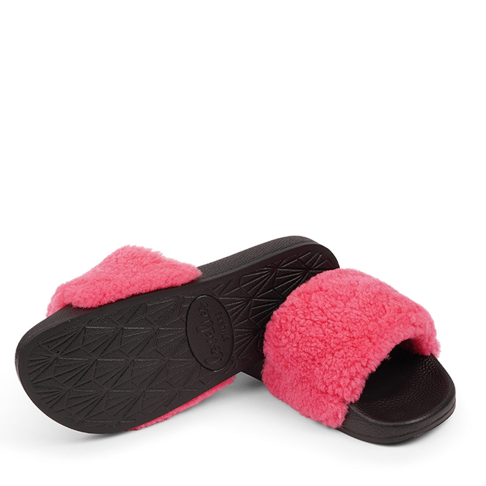 Slides with Australian Shearling upper.  This wonderful slide has a soft and light rubber sole which makes it very comfortable and an all time favorite sandal. The 100% shearling wool will keep you warm or cool you down on hot summer days.