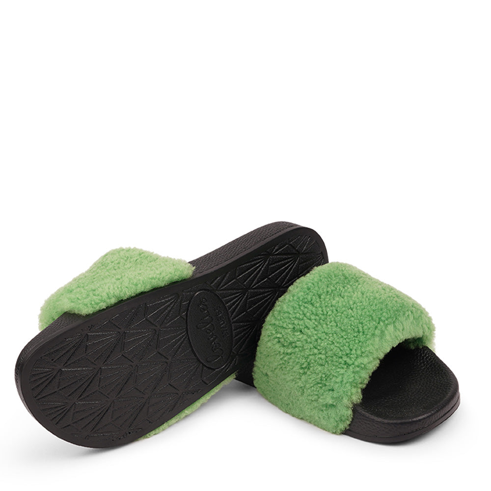 Slides with Australian Shearling upper.  This wonderful slide has a soft and light rubber sole which makes it very comfortable and an all time favorite sandal. The 100% shearling wool will keep you warm or cool you down on hot summer days.