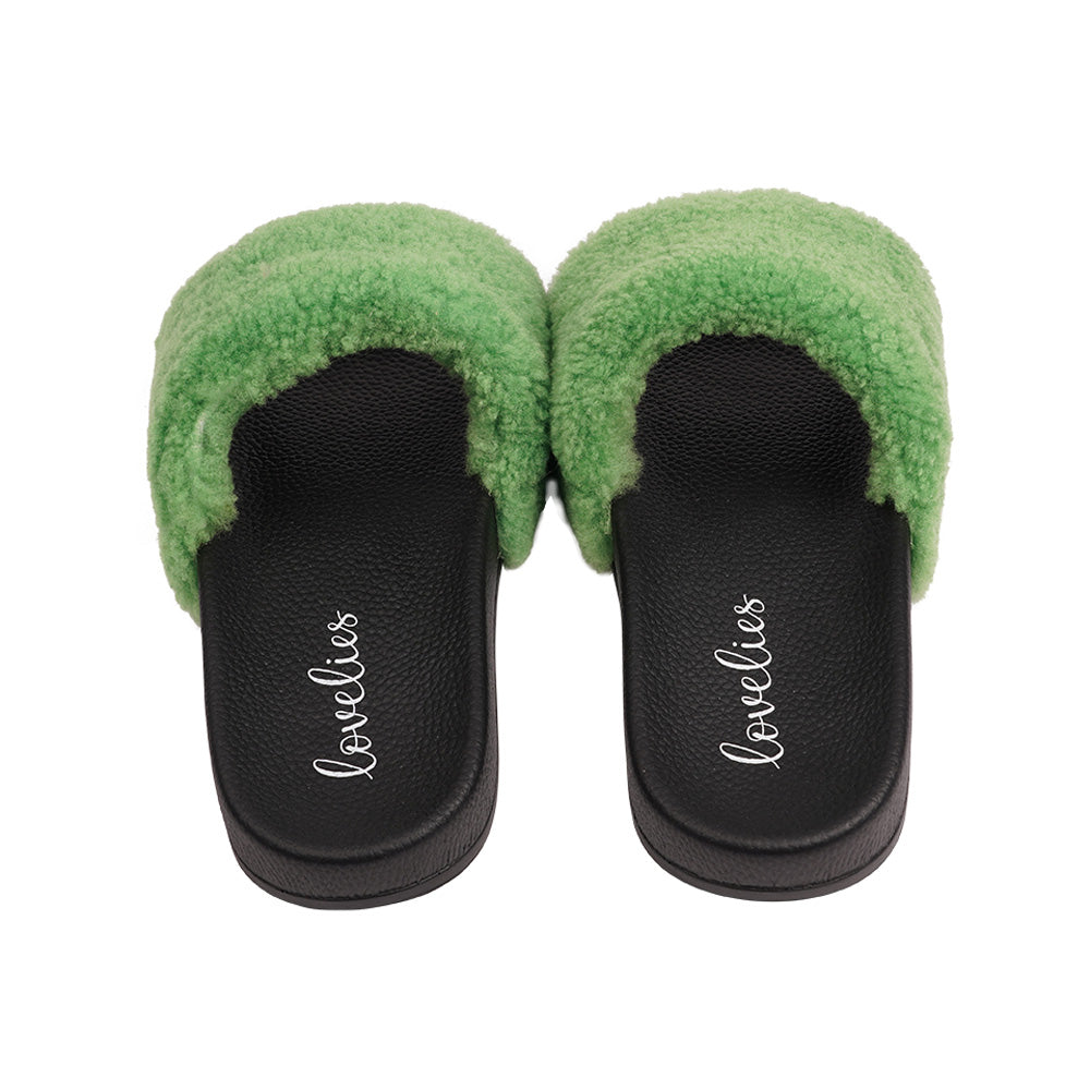 Slides with Australian Shearling upper.  This wonderful slide has a soft and light rubber sole which makes it very comfortable and an all time favorite sandal. The 100% shearling wool will keep you warm or cool you down on hot summer days.