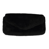 Understated and elegant, this Cona shearling clutch with detachable crossbody strap comes in both black and cream. Cona is perfect for carrying your essentials with you for party or everyday use.  Front flap with hidden magnetic fastening  Adjustable and detachable wrist strap  Adjustable and detachable shoulder strap in leather  Shoulder strap 105 cm and 15 mm wide  Lining of suede and soft skin