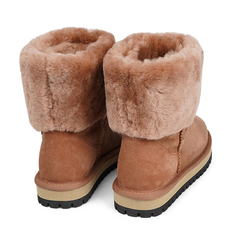 Lovelies Studio - Mid-high Shearling boots  Lovelies shearling boots bring softness and warmth to your feet this autumn. With soft and durable rubber soles plus a gorgeous design you're perfectly suited for the wintertime.  Danish Design