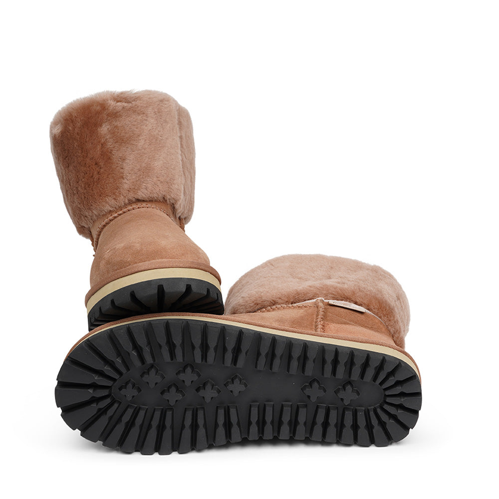 Lovelies Studio - Mid-high Shearling boots  Lovelies shearling boots bring softness and warmth to your feet this autumn. With soft and durable rubber soles plus a gorgeous design you're perfectly suited for the wintertime.  Danish Design