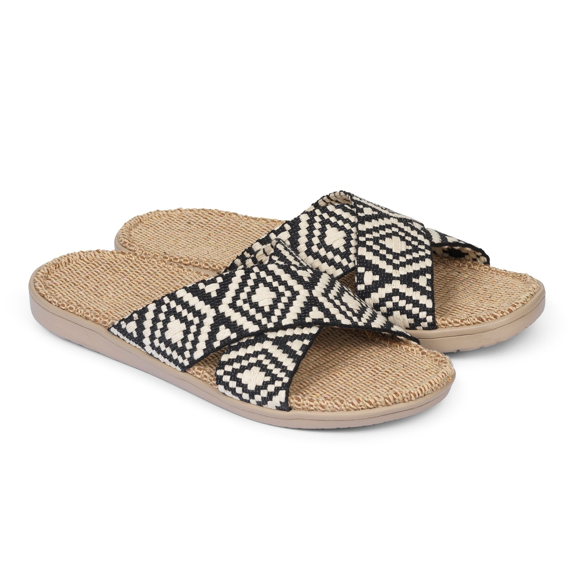 Sandal with woven straps. The soft inner sole is covered with jute.