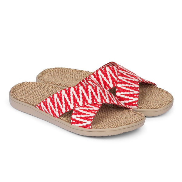 Sandal with woven straps. The soft inner sole is covered with jute.